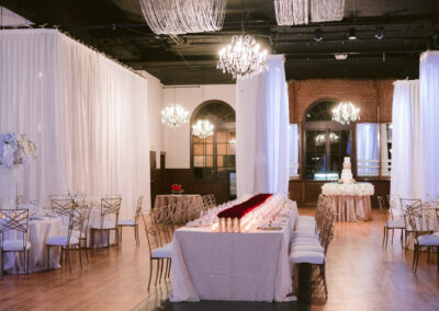 indoor wedding reception with luxury monogram on floor